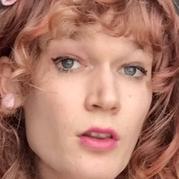 Evelyn Tumbles Nude